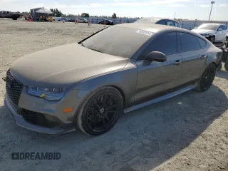 2016 Audi RS 7 Prestige z VIN WUAW2AFC2GN904024, wystawiony jako Copart lot #75000924 z przebiegiem 51 434 mil mil oraz Szkody całkowita. Historia ofert i sprzedaży dostępna na DreamBid. Obrazek 1.