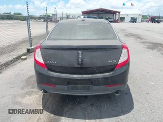 2014 Lincoln MKS with VIN 1LNHL9DK0EG605429, listed as a IAAI auction lot 42809745 with 127,038 mi miles and . Bid and sale history available at DreamBid. Image 16.