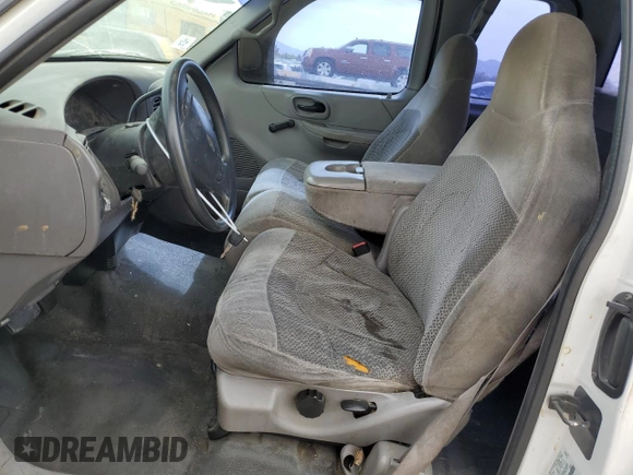1999 Ford F-150 XL with VIN 1FTZX0721XKA49751, listed as a Copart auction lot 52429195 with Not provided miles and Salvage title. Bid and sale history available at DreamBid. Image 7.