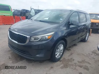 2015 Kia Sedona LX with VIN KNDMB5C16F6065437, listed as a IAAI auction lot 42079430 with 149,991 mi miles and . Bid and sale history available at DreamBid. Image 2.