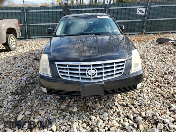 2011 Cadillac DTS z VIN 1G6KA5E69BU102492, wystawiony jako Copart lot #79293954 z przebiegiem 182 372 mil mil oraz Szkoda całkowita • Salvage title. Historia ofert i sprzedaży dostępna na DreamBid. Obrazek 5.