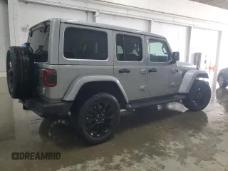 2021 Jeep Wrangler Unlimited Sahara with VIN 1C4JJXP65MW682462, listed as a Copart auction lot 58673385 with 38,714 mi miles and Salvage title. Bid and sale history available at DreamBid. Image 3.