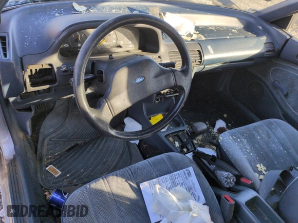 1993 Ford Escort z VIN 1FAPP15J7PW181838, wystawiony jako Copart lot #88717755 z przebiegiem 6 017 mil mil oraz Szkoda całkowita • Salvage title. Historia ofert i sprzedaży dostępna na DreamBid. Obrazek 8.