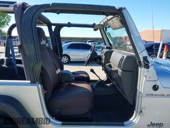 2002 Jeep Wrangler X with VIN 1J4FA39S42P763835, listed as a IAAI auction lot 42302645 with 233,634 mi miles and . Bid and sale history available at DreamBid. Image 5.