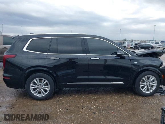 2023 Cadillac XT6 FWD Luxury with VIN 1GYKPAR44PZ114020, listed as a IAAI auction lot 41669115 with 110,305 mi miles and . Bid and sale history available at DreamBid. Image 14.