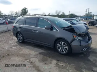 2015 Honda Odyssey Touring Elite с VIN 5FNRL5H96FB024814, выставлен на аукционе IAAI как лот 41605481 с пробегом 128 999 миль миль и . История ставок и продаж доступна на DreamBid. Изображение 1.
