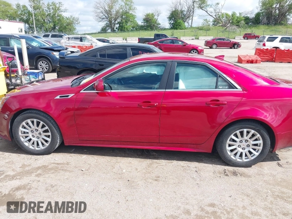 2011 Cadillac CTS with VIN 1G6DC5EY2B0143073, listed as a IAAI auction lot 42322497 with 133,992 mi miles and . Bid and sale history available at DreamBid. Image 14.