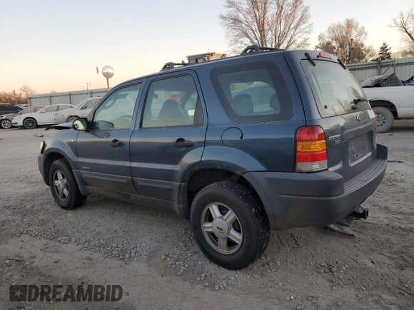 2001 Ford Escape XLS with VIN 1FMYU02191KA64617, listed as a Copart auction lot 83853044 with 187,594 mi miles and Salvage Title. Bid and sale history available at carsss.com. Image 2.