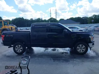 2019 Ford F-150 XL with VIN 1FTEW1E56KFA63764, listed as a IAAI auction lot 42410872 with 124,648 mi miles and . Bid and sale history available at DreamBid. Image 13.