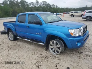 2009 Toyota Tacoma PreRunner with VIN 3TMJU62N99M082065, listed as a Copart auction lot 50783825 with 259,413 mi miles and Salvage title. Bid and sale history available at DreamBid. Image 4.