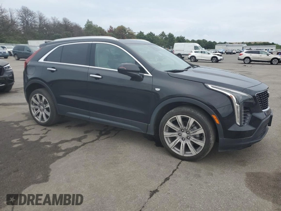2021 Cadillac XT4 AWD Luxury with VIN 1GYFZBR4XMF014647, listed as a Copart auction lot 63800444 with 49,724 mi miles and Salvage Title. Bid and sale history available at carsss.com. Image 4.