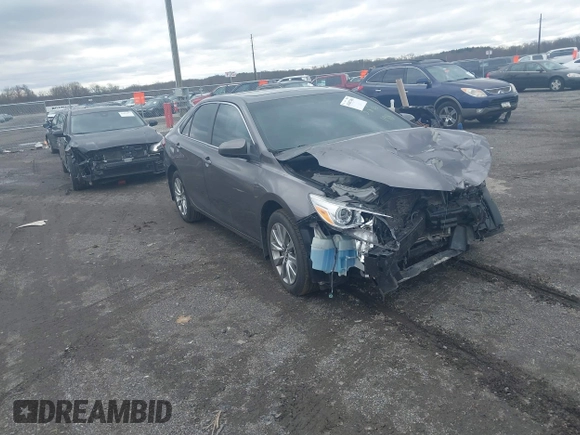 2015 Toyota Camry XLE with VIN 4T1BF1FKXFU936775, listed as a IAAI auction lot 41807486 with 97,148 mi miles and . Bid and sale history available at DreamBid. Image 1.