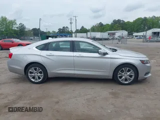 2014 Chevrolet Impala LT with VIN 2G1125S3XE9114130, listed as a IAAI auction lot 42128077 with 209,391 mi miles and . Bid and sale history available at DreamBid. Image 13.