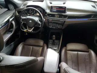 2020 BMW X1 xDrive28i z VIN WBXJG9C00L5P42487, wystawiony jako Copart lot #59669325 z przebiegiem 88 402 mil mil oraz Szkoda całkowita • Salvage title. Historia ofert i sprzedaży dostępna na DreamBid. Obrazek 8.