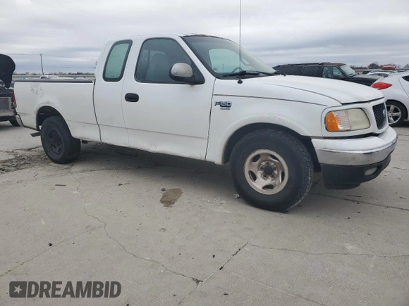 2000 Ford F-150 XL with VIN 1FTRX17W7YNB87528, listed as a Copart auction lot 88470995 with 0 mi miles and Salvage Title. Bid and sale history available at carsss.com. Image 4.