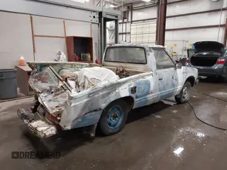 1982 Datsun 720 z VIN JN6MD01S7CW103064, wystawiony jako IAAI lot #41831434 z przebiegiem 175 954 mil mil oraz . Historia ofert i sprzedaży dostępna na DreamBid. Obrazek 4.