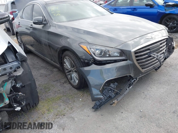 2018 Genesis G80 3.8L z VIN KMHGN4JE7JU262623, wystawiony jako IAAI lot #41230215 z przebiegiem 94 006 mil mil oraz . Historia ofert i sprzedaży dostępna na DreamBid. Obrazek 1.