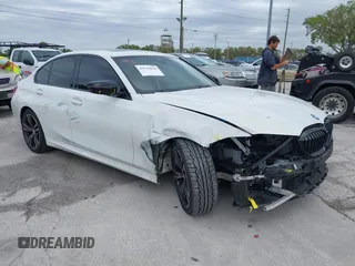 2022 BMW 3 Series 330i with VIN 3MW5R1J06N8C46898, listed as a IAAI auction lot 41715618 with 44,533 mi miles. Bid and sale history available at carsss.com. Image 1.