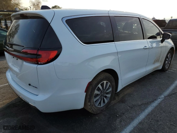2023 Chrysler Pacifica Hybrid Touring L with VIN 2C4RC1L72PR592594, listed as a Copart auction lot 43285825 with 30,309 mi miles and Salvage Title. Bid and sale history available at carsss.com. Image 3.
