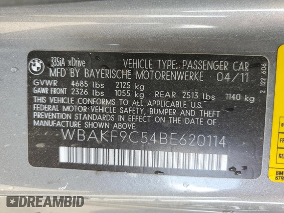 2011 BMW 3 Series 335i xDrive with VIN WBAKF9C54BE620114, listed as a Copart auction lot 56594205 with 85,473 mi miles and Salvage title. Bid and sale history available at DreamBid. Image 12.