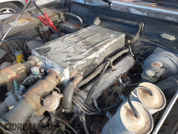 1982 Maserati Quattroporte z VIN ZAMBC1102CA301920, wystawiony jako IAAI lot #41297603 z przebiegiem 62 287 mil mil oraz . Historia ofert i sprzedaży dostępna na DreamBid. Obrazek 10.