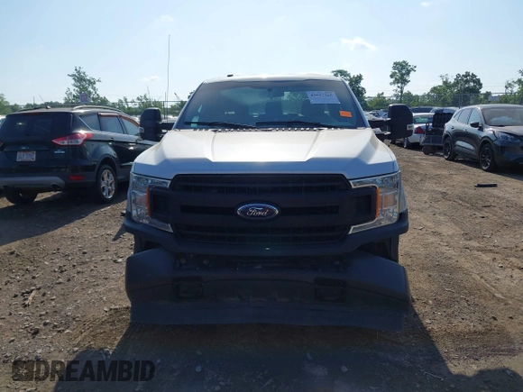 2018 Ford F-150 XL with VIN 1FTFX1EG1JKD86371, listed as a IAAI auction lot 42617305 with 212,187 mi miles and . Bid and sale history available at DreamBid. Image 12.