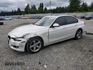 2013 BMW 3 Series 328i with VIN WBA3C1C53DF443745, listed as a Copart auction lot 62609435 with 137,573 mi miles and Salvage title. Bid and sale history available at DreamBid. Image 1.