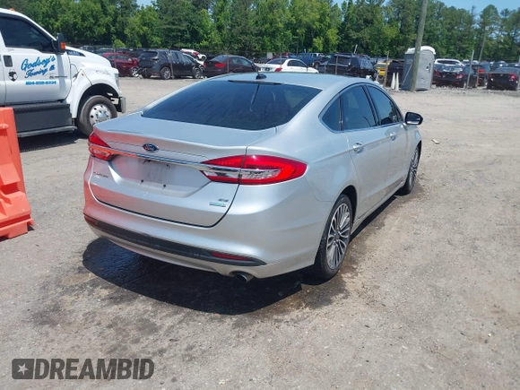 2017 Ford Fusion SE with VIN 3FA6P0HDXHR372203, listed as a IAAI auction lot 42392330 with 172,266 mi miles and . Bid and sale history available at DreamBid. Image 4.