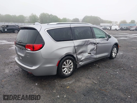 2018 Chrysler Pacifica Touring L with VIN 2C4RC1BGXJR142295, listed as a IAAI auction lot 41952592 with 135,092 mi miles and . Bid and sale history available at DreamBid. Image 4.