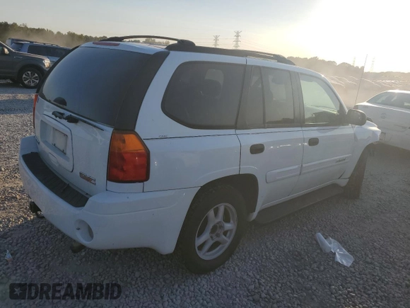 2004 GMC Envoy SLE with VIN 1GKDS13S542233286, listed as a Copart auction lot 76129164 with 228,981 mi miles and Salvage Title. Bid and sale history available at DreamBid. Image 3.
