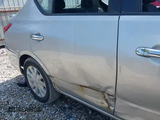 2016 Nissan Versa S with VIN 3N1CN7AP3GL885717, listed as a IAAI auction lot 42283825 with 233,517 mi miles and . Bid and sale history available at DreamBid. Image 12.