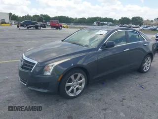 2014 Cadillac ATS Standard AWD with VIN 1G6AG5RX9E0173779, listed as a IAAI auction lot 42172080 with 102,293 mi miles and . Bid and sale history available at carsss.com. Image 2.