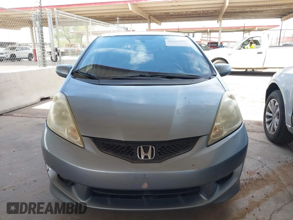 2011 Honda Fit Sport z VIN JHMGE8H54BC021562, wystawiony jako IAAI lot #42369683 z przebiegiem 176 212 mil mil oraz . Historia ofert i sprzedaży dostępna na DreamBid. Obrazek 6.