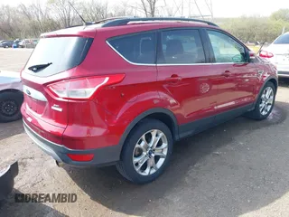 2013 Ford Escape SEL with VIN 1FMCU0H97DUA28747, listed as a IAAI auction lot 41932894 with 165,878 mi miles. Bid and sale history available at carsss.com. Image 4.