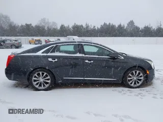 2013 Cadillac XTS with VIN 2G61N5S37D9112979, listed as a IAAI auction lot 41209826 with 83,237 mi miles. Bid and sale history available at carsss.com. Image 13.