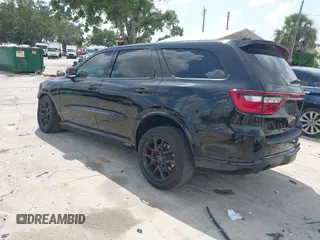 2023 Dodge Durango SRT Hellcat Premium with VIN 1C4SDJH9XPC554953, listed as a IAAI auction lot 42375728 with 19,492 mi miles and . Bid and sale history available at DreamBid. Image 3.