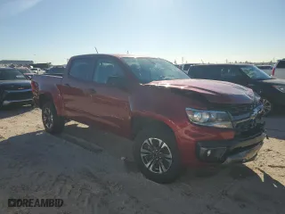 2021 Chevrolet Colorado 2WD Z71 with VIN 1GCGSDEN8M1222192, listed as a Copart auction lot 84914784 with 77,941 mi miles and Salvage Title. Bid and sale history available at carsss.com. Image 4.