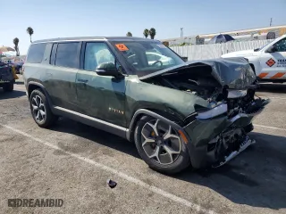 2023 Rivian R1S Adventure with VIN 7PDSGABAXPN005180, listed as a Copart auction lot 66652024 with 0 mi miles and Salvage Title. Bid and sale history available at carsss.com. Image 4.