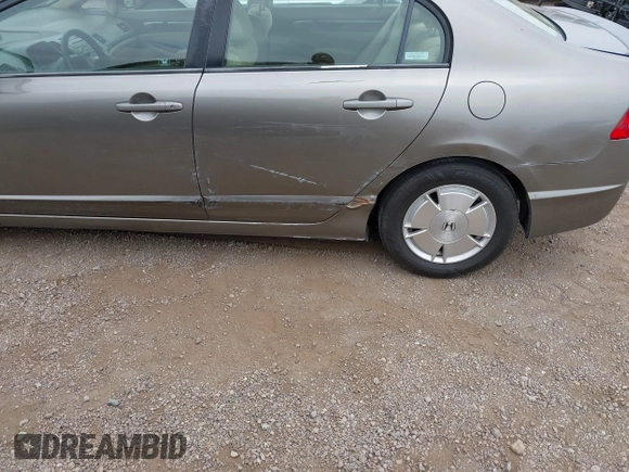 2006 Honda Civic z VIN JHMFA36286S006836, wystawiony jako IAAI lot #42324244 z przebiegiem 217 417 mil mil oraz . Historia ofert i sprzedaży dostępna na DreamBid. Obrazek 6.