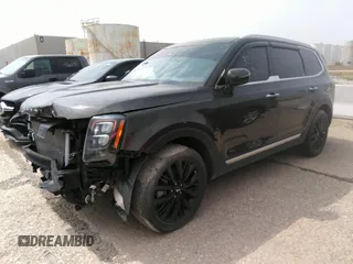 2020 Kia Telluride SX with VIN 5XYP5DHC7LG003935, listed as a IAAI auction lot 32399947 with 82,256 mi miles and . Bid and sale history available at DreamBid. Image 2.
