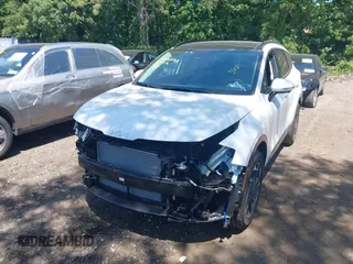 2025 Kia Sportage SX-Prestige with VIN 5XYK5CDF2SG301912, listed as a IAAI auction lot 42553193 with 1,816 mi miles and . Bid and sale history available at DreamBid. Image 6.