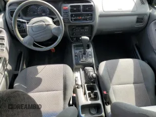 2002 Chevrolet Tracker ZR2 z VIN 2CNBJ734426936514, wystawiony jako Copart lot #54051825 z przebiegiem 229 668 mil mil oraz Szkoda całkowita • Salvage title. Historia ofert i sprzedaży dostępna na DreamBid. Obrazek 8.