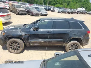 2016 Jeep Grand Cherokee Overland with VIN 1C4RJFCG5GC408390, listed as a IAAI auction lot 42140038 with 140,507 mi miles and . Bid and sale history available at DreamBid. Image 14.