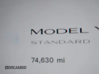2021 Tesla Model Y Standard Range with VIN 5YJYGDED8MF123246, listed as a IAAI auction lot 41291676 with 74,630 mi miles and . Bid and sale history available at DreamBid. Image 7.