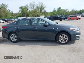 2016 Kia Optima LX with VIN KNAGT4L37G5073752, listed as a IAAI auction lot 42132621 with 136,818 mi miles. Bid and sale history available at carsss.com. Image 13.