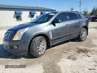 2013 Cadillac SRX Performance Collection z VIN 3GYFNDE35DS592493, wystawiony jako Copart lot #49145535 z przebiegiem 138 746 mil mil oraz Szkoda całkowita • Salvage title. Historia ofert i sprzedaży dostępna na DreamBid. Obrazek 1.