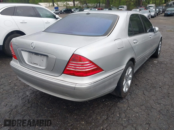 2002 Mercedes-Benz S-Class 5.0L with VIN WDBNG75J32A241980, listed as a IAAI auction lot 41971627 with 160,634 mi miles. Bid and sale history available at carsss.com. Image 4.