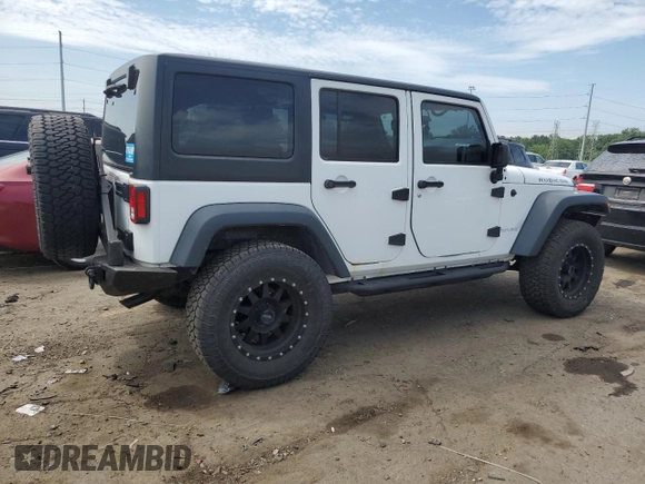 2017 Jeep Wrangler Unlimited Rubicon Recon with VIN 1C4BJWFG5HL511601, listed as a Copart auction lot 62656715 with 86,465 mi miles and Salvage title. Bid and sale history available at DreamBid. Image 3.