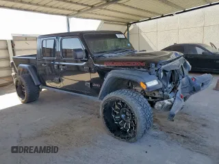 2020 Jeep Gladiator Rubicon с VIN 1C6JJTBG5LL116138, выставлен на аукционе Copart как лот 58061265 с пробегом 50 274 миль миль и Списание • Salvage title. История ставок и продаж доступна на DreamBid. Изображение 4.