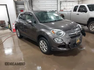 2016 FIAT 500X Easy z VIN ZFBCFYBT1GP369231, wystawiony jako IAAI lot #41668543 z przebiegiem 124 661 mil mil oraz . Historia ofert i sprzedaży dostępna na DreamBid. Obrazek 1.